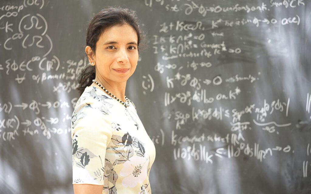 Anima at chalkboard
