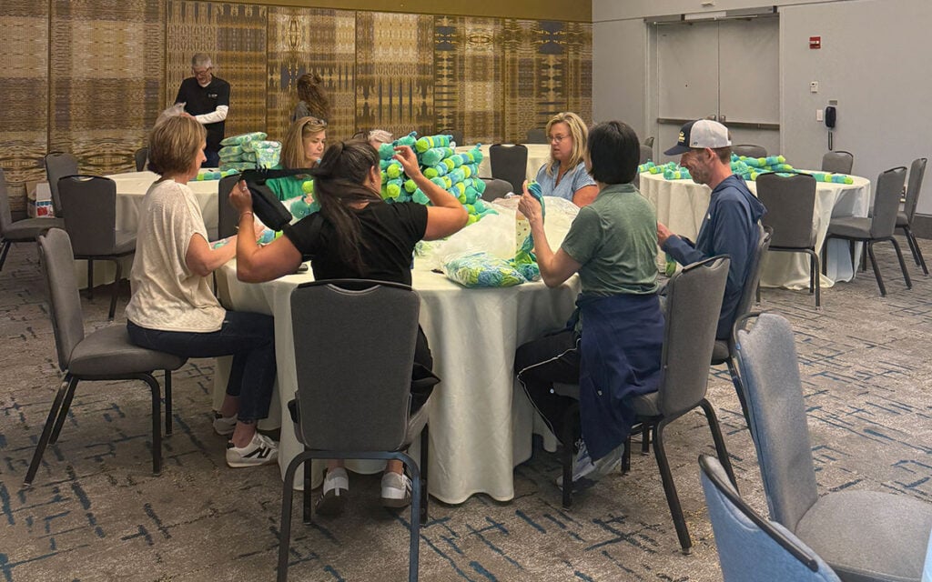 volunteers at table